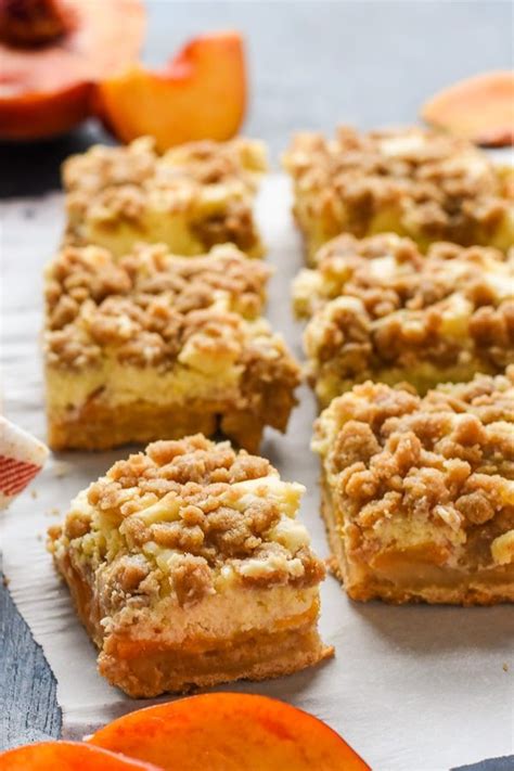 peach-crumble-cheesecake-bars-honest-cooking image