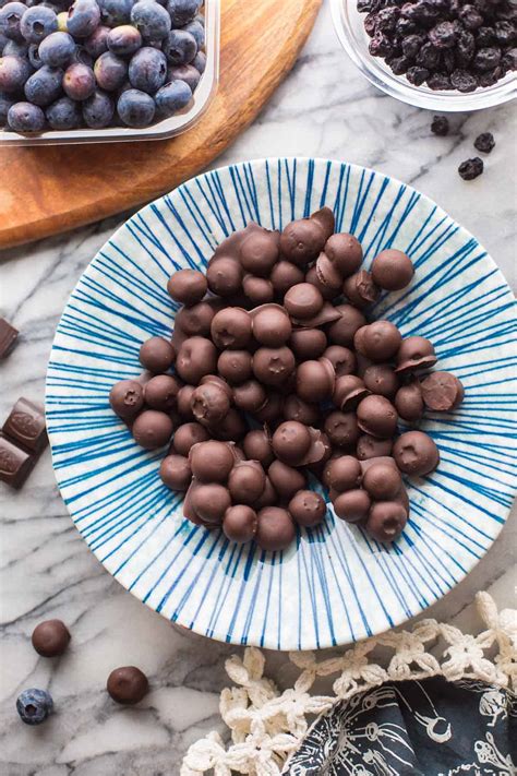 chocolate-covered-blueberries-fresh-or-dried-a-saucy image