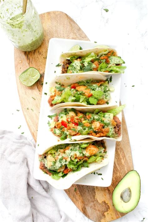 crispy-vegan-potato-tacos-with-jalapeo-cilantro-sauce image