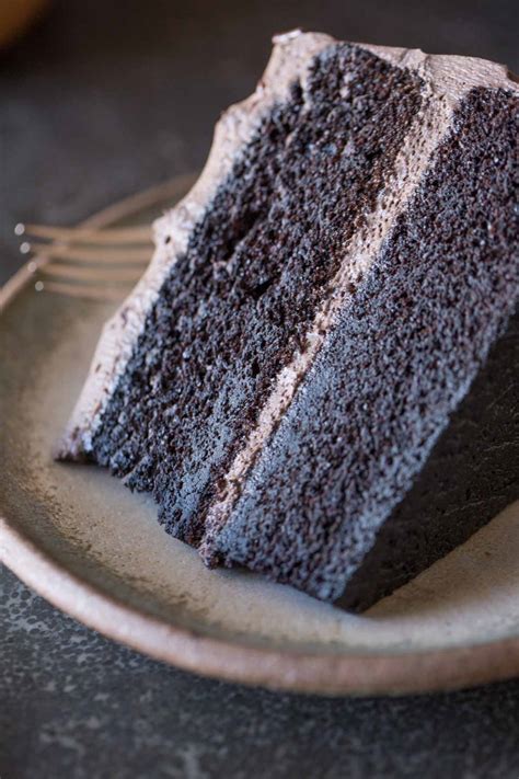 dark-chocolate-cake-with-whipped-cream-frosting image