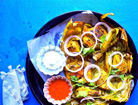 chicken-cooked-in-banana-leaves-recipe-archanas image