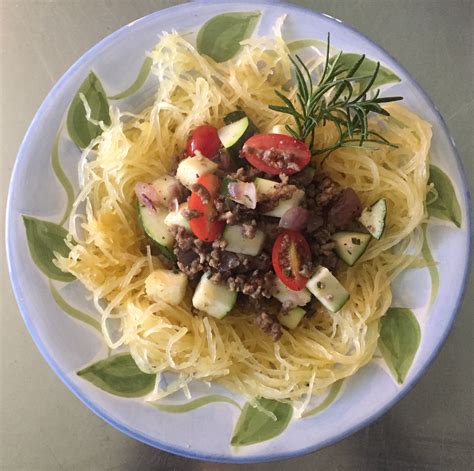lamb-zucchini-tomatoes-atop-roasted-spaghetti image
