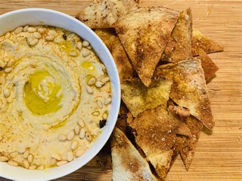 homemade-hummus-with-toasted-pita-chips image