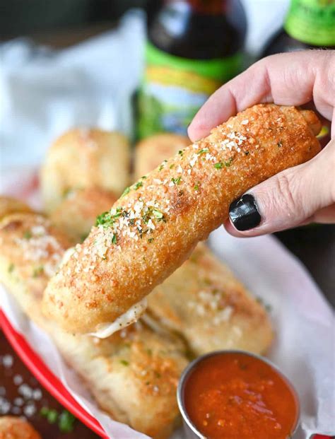 stuffed-pepperoni-pizza-sticks-butter-your-biscuit image