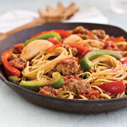 spaghetti-with-sausage-and-peppers-recipe-myrecipes image