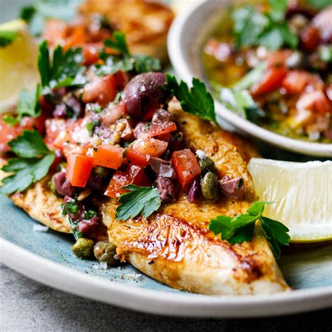 chicken-breasts-with-olive-tomato-and-caper-dressing image