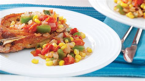 smoky-pork-chops-with-maque-choux-style-vegetables image