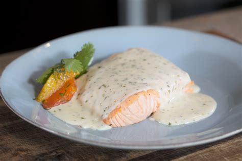 perfectly-poached-salmon-and-tarragon-cream-sauce image