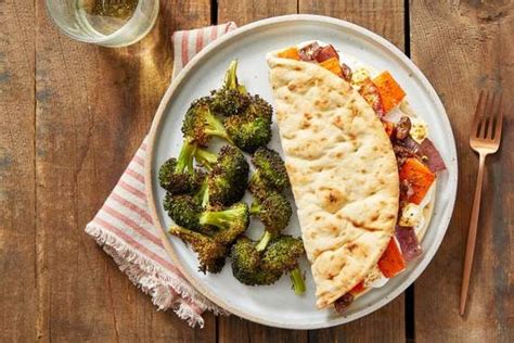 greek-style-veggie-pitas-with-lemon-dressed-broccoli image