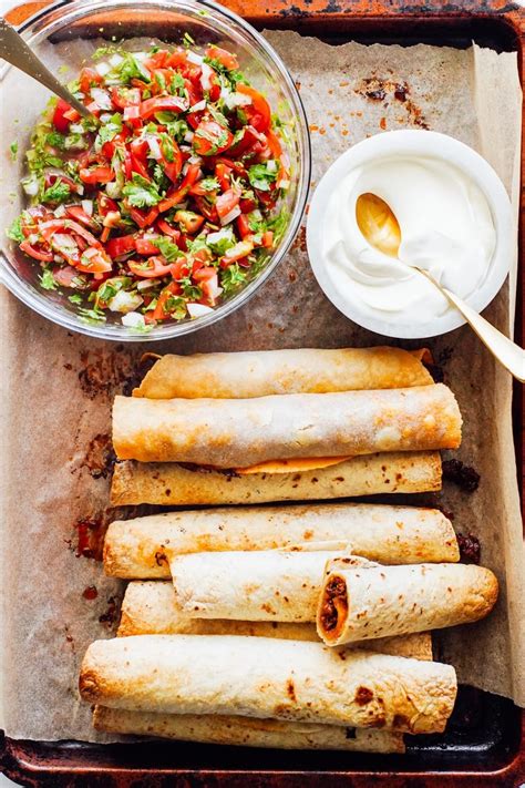 baked-ground-beef-taquitos-live-simply image