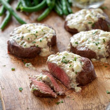 beef-tenderloin-steaks-with-blue-cheese-topping image
