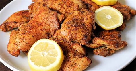 oven-baked-lemon-pepper-chicken-thighs-kindly image