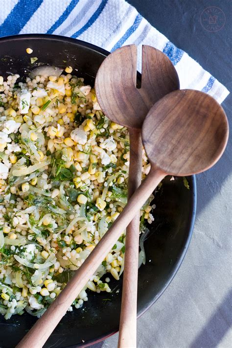 herbed-israeli-couscous-salad-with-corn-and-feta image