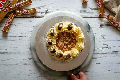 the-ultimate-twix-cake-crumbs-and-corkscrews image