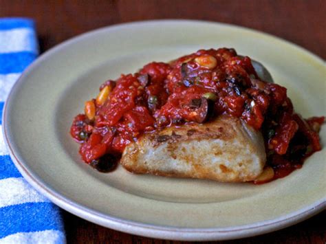 italian-swordfish-recipe-with-tomatoes-olives-pine-nuts image