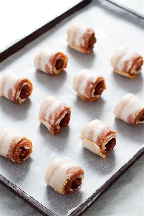 baked-bacon-wrapped-dates-recipe-bacon-appetizer image