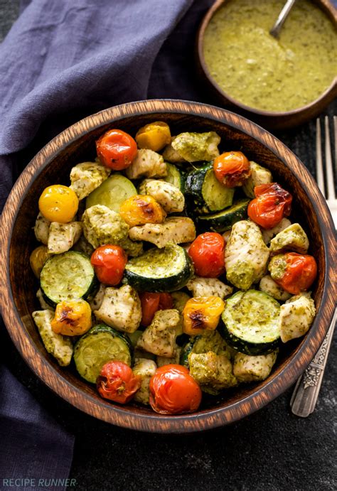 sheet-pan-pesto-chicken-with-zucchini-and-tomatoes image