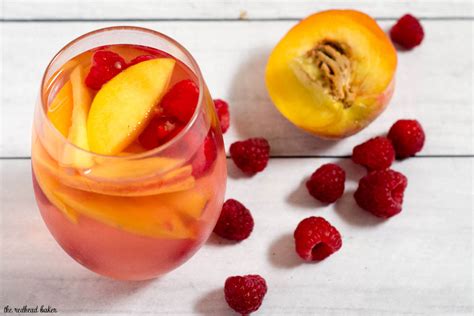 raspberry-peach-sangria-recipe-by-the-redhead-baker image