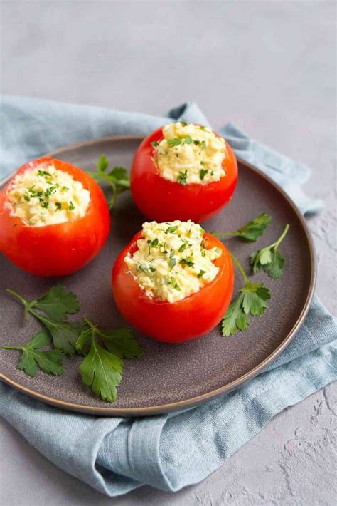 egg-salad-stuffed-tomatoes-hard-boiled-egg image