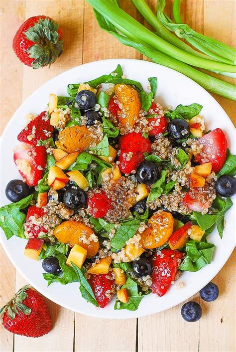 quinoa-salad-with-spinach-strawberries-and-blueberries image