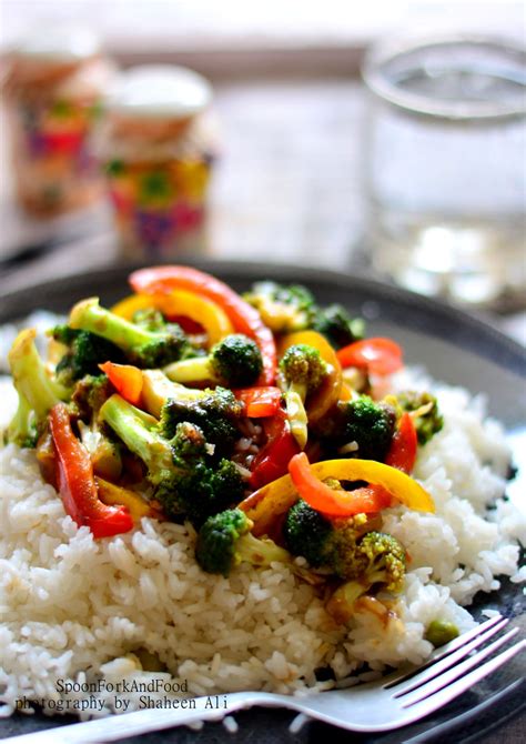 stir-fried-broccoli-bell-peppers-spoon-fork-and-food image