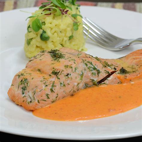baked-salmon-in-a-roasted-red-pepper-cream-sauce image