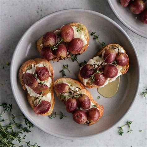 roasted-grape-crostini-with-whipped-ricotta-and-honey image