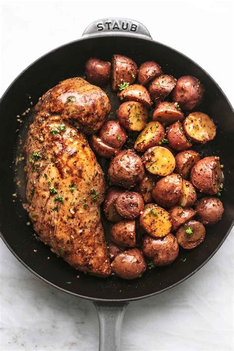 baked-pork-tenderloin-with-potatoes-and-gravy image