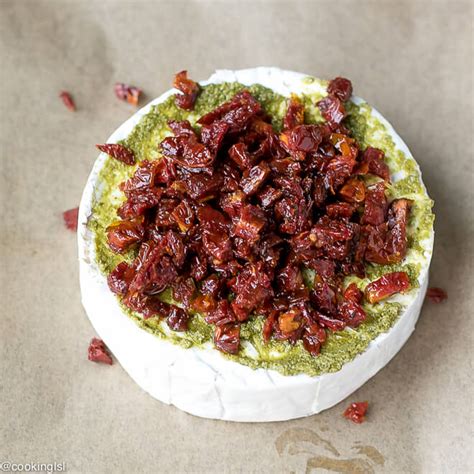 savory-baked-brie-appetizer-with-sun-dried-tomatoes image