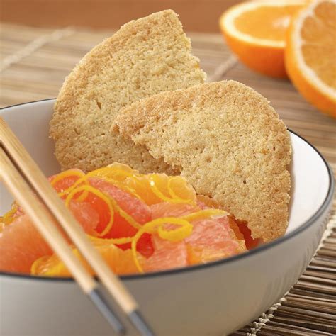 orange-crisps-with-citrus-fruit-salad-recipe-eatingwell image