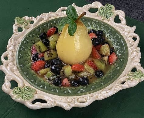 sweet-white-wine-poached-pears-with-fresh-fruit image