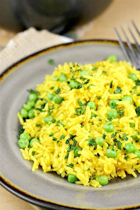 simple-turmeric-rice-with-peas-ericas image
