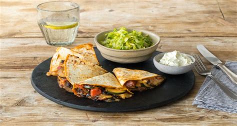 zucchini-and-black-bean-quesadillas-recipe-hellofresh image