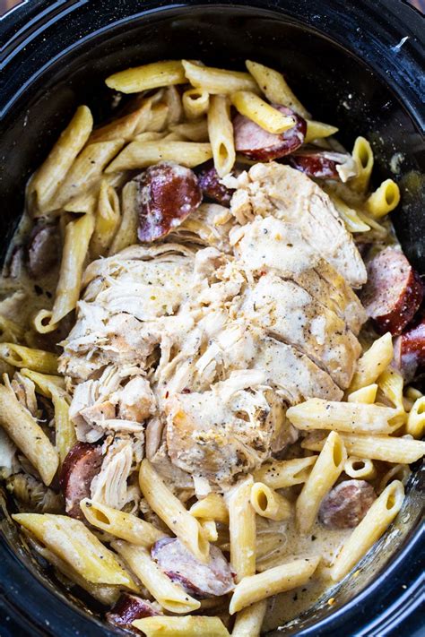 slow-cooker-cajun-chicken-alfredo-with-sausage-spicy image