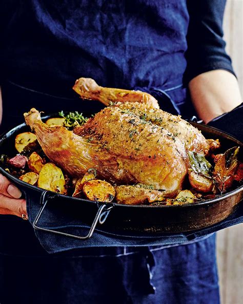 roast-chicken-with-lemon-garlic-and-thyme-delicious image