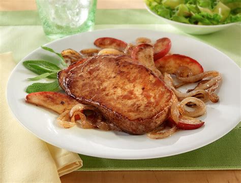 pork-chops-with-caramelized-onions-apples-land image