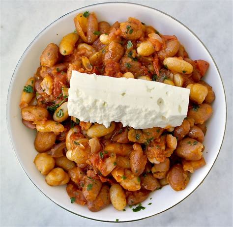 greek-style-beans-with-tomato-sauce-and-feta-cheese image
