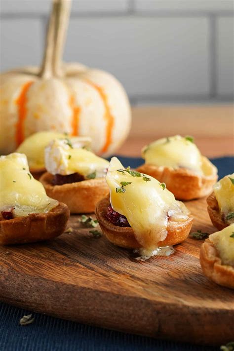 cranberry-brie-tarts-nibble-and-dine image