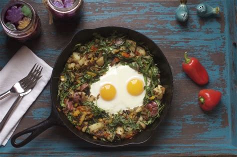 arugula-hash-with-oven-baked-eggs-spinach-tiger image