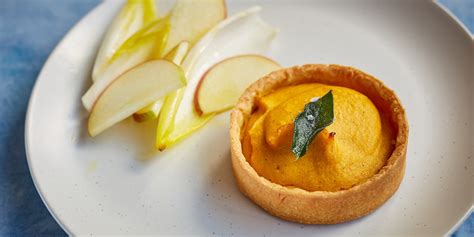 curried-squash-tartlet-with-apple-and-chicory-salad image