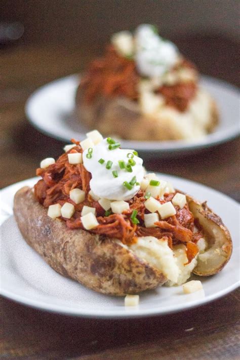 pulled-pork-loaded-baked-potatoes-thekittchen image