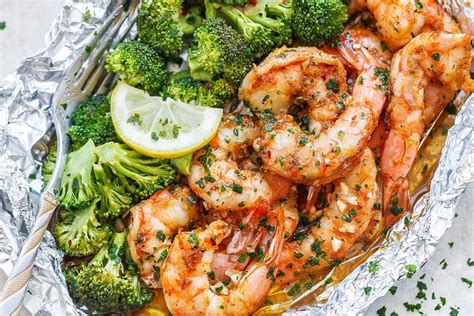 baked-shrimp-in-foil-packs-recipe-with-garlic-lemon image