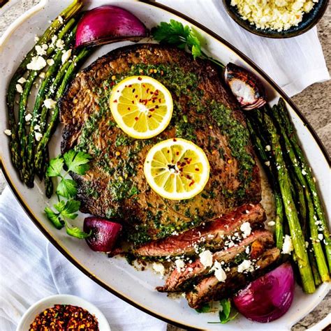 seared-flank-steak-with-herb-butter-blackstone image