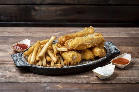 guinness-battered-fish-and-chips-recipe-wine-enthusiast image