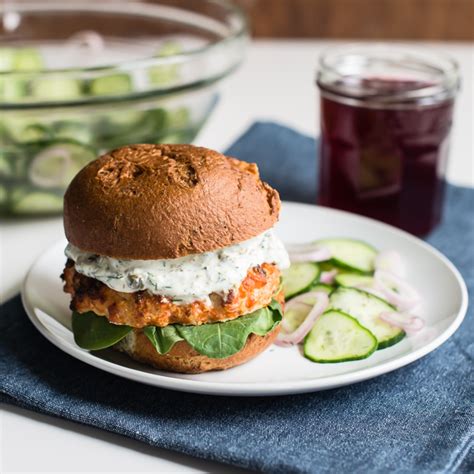 salmon-burgers-with-quick-pickled-cucumber-salad image