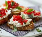 tomato-crostini-topped-with-cottage-cheese-tesco image