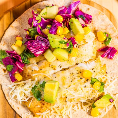 easy-15-minute-fish-tacos-with-avocado-corn-salsa image