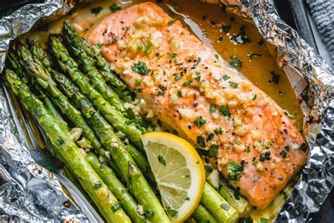 baked-salmon-in-foil-with-asparagus-and-lemon-garlic image