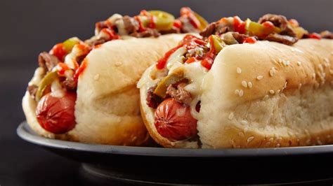 philly-cheesesteak-hot-dog-recipe-tablespooncom image
