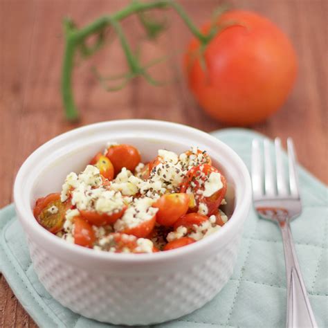 baked-cherry-tomatoes-and-feta-lemon-olives image